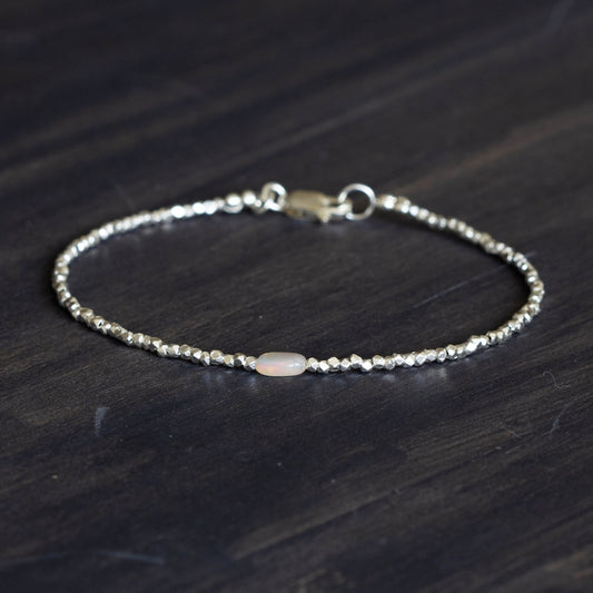 Dainty Fine Silver Bracelet with Welo Opal, Skinny Karen Hill Tribe Silver Stacking Bracelet