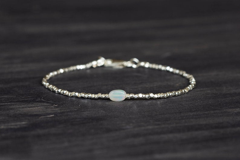 Dainty Fine Silver Bracelet with Welo Opal, Skinny Karen Hill Tribe Silver Stacking Bracelet