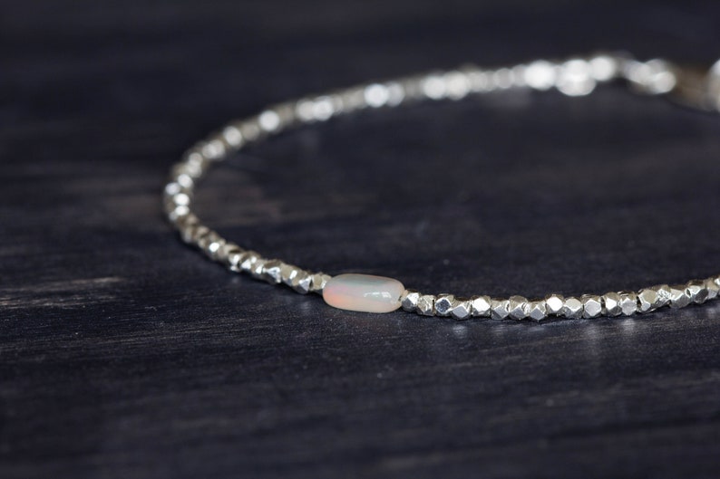 Dainty Fine Silver Bracelet with Welo Opal, Skinny Karen Hill Tribe Silver Stacking Bracelet